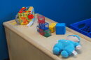 Toys are scattered along a shelf at Shepherd Community Center’s Minnie Hartmann Neighborhood Childcare facility on Tuesday, July 21, 2026.