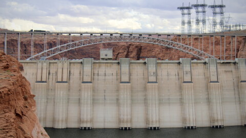 Water levels sit low behind Glen Canyon Dam in Page, Arizona on November 2, 2022. Colorado River experts say long-term changes are needed to keep the region's water use sustainable and avoid catastrophe at major dams and reservoirs.