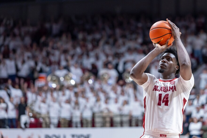 Alabama center Charles Bediako (14) shoots a free throw against Tennessee during the second half of an NCAA college basketball game Saturday, Jan. 24, 2026, in Tuscaloosa, Ala. (AP Photo/Vasha Hunt)