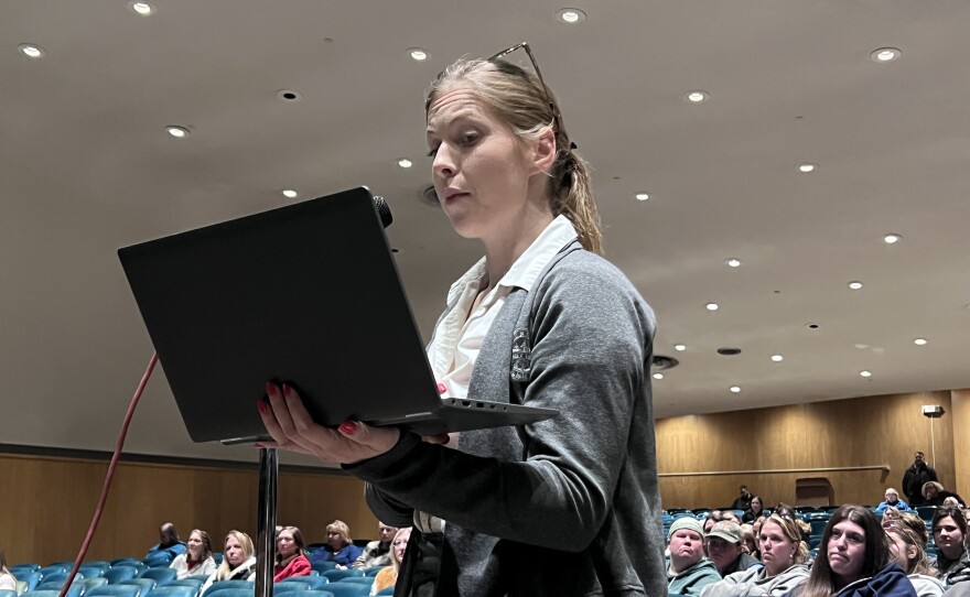 Ashton Martin discusses administrative pay in the district during a March 26, 2026, public hearing at Lincoln Middle School in Hibbing, as the School Board considers closing Greenhaven Elementary School.