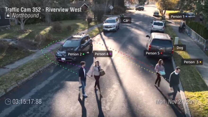 An image from a presentaton by Amazon's Ranju Das shows a demonstration of real-time facial recognition and tracking. Das said the video came from a traffic cam in Orlando, Fla., where police were in a pilot program of Amazon's Rekognition service.