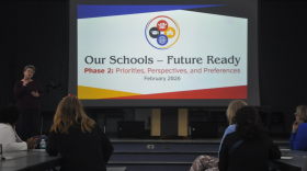 Kathie Ebaugh, a community planner for local civil engineering firm JBPro, begins her presentation in Kanapaha Middle School’s cafeteria.