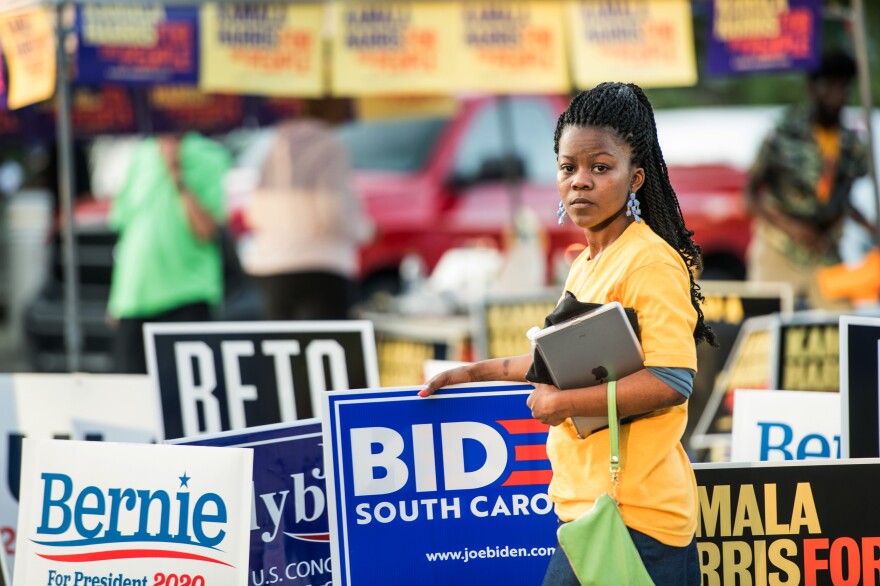 Kanesha Adams stands in the parking lot outside of Jim Clyburn's World-Famous Fish Fry on June 21 in Columbia, S.C. The event featured appearances by 21 Democratic presidential candidates seeking voters in the early primary state.