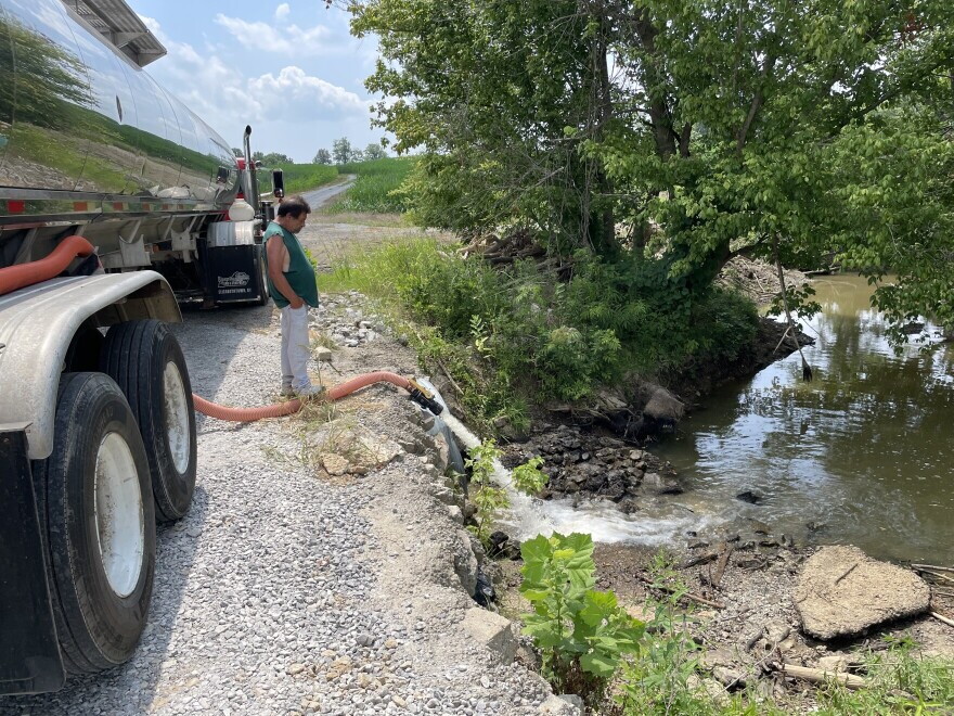 Thousands of gallons of water are being dumped by tanker trucks into Crooked Creek, which flows into Marion’s remaining water supply.