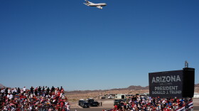 Air Force One with President Donald Trump aboard flys past before landing for a campaign rally at the Laughlin Bullhead International Airport, Wednesday, Oct. 14, 2026, in Bullhead City, Ariz.