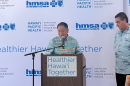 HMSA President & CEO Dr. Mark Mugiishi, left, and Hawaiʻi Pacific Health President & CEO Ray Vara at a news conference Wednesday, Jan. 7, at the Harry and Jeanette Weinberg Hoʻokupu Center.