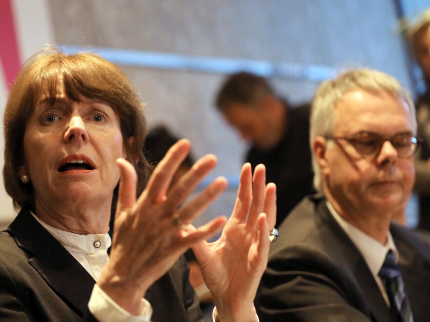 Cologne Mayor Henriette Reker and police chief Wolfgang Albers speak to the press after a meeting to discuss the New Year's Eve attacks. Albers has described the gangs as looking "Arab or North African," but Reker warned against drawing hasty conclusions about their identity.
