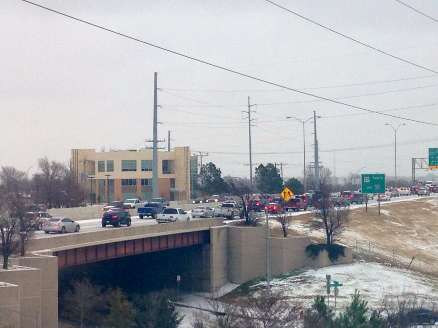 Traffic is at a crawl along southbound I-235 just north of the Dallas junction late Thursday afternoon. Forecasters say travel will be particularly dangerous overnight into Friday.