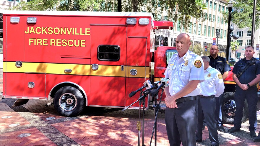 Jacksonville Fire Chief Keith Powers shows the two new critical care rescue units in James Weldon Johnson Park Downtown, joined by the men and women who have been trained to operate them.