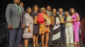 Award recipients and event organizers pose at the conclusion of the 2024 Governor’s Reception on June 25, 2024, in the Indiana Convention Center in Indianapolis. The Indiana Civil Rights Commission honored six Black Hoosiers for their efforts to advance diversity and equality.