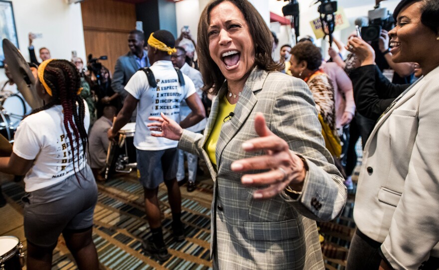 Sen. Kamala Harris dances with a marching band upon arrival at the South Carolina Democratic Party Convention in June 2019, when she was a presidential candidate in the Democratic primary race.