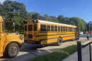 School buses line up outside Milwaukee Parkside School for the Arts on Sept. 23, 2026. Most standard size buses have 70-80 gallon fuel tanks.