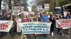 Protesters marched through uptown Charlotte on Saturday, Nov. 15, 2025 as U.S. Border Patrol agents began a citywide