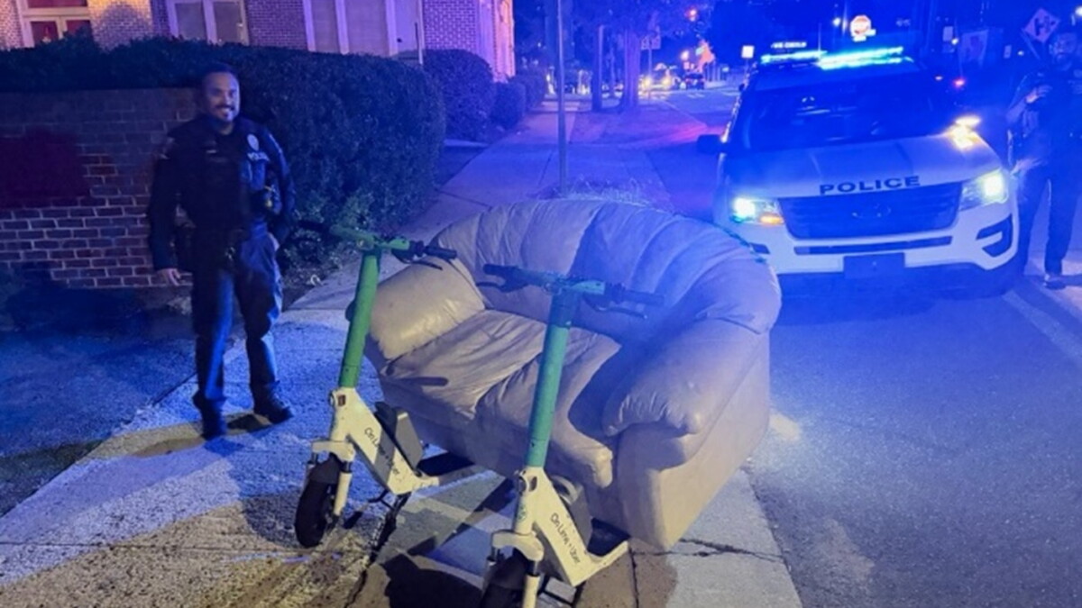 Living room on the loose: CMPD stops couch-surfers cruising down South Tryon