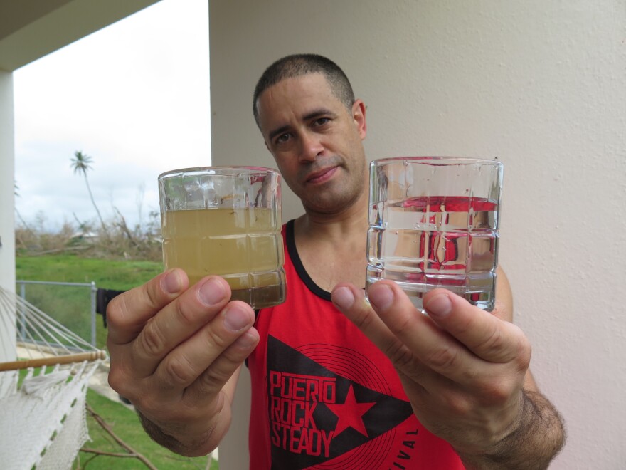 Richard Colón, better known by his stage name Crazy Legs at his home in Isabela, Puerto Rico, shows the before-and-after of the water filtration system he's helping deliver to people in remote areas.