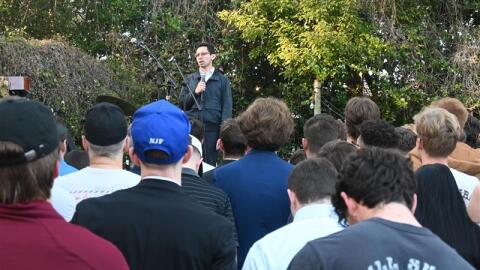 Florida State University students watch Republican Gubernatorial candidate James Fishback during a campaign rally in the backyard of a student's rental house on Jan. 23, 2026.