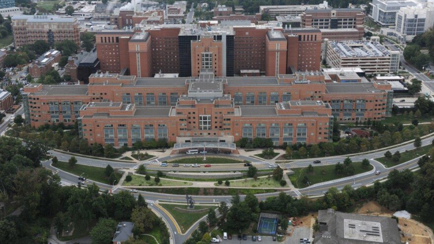 An American who contracted Ebola while volunteering in Sierra Leone was admitted to the hospital at the NIH Clinical Center in Bethesda early Friday.