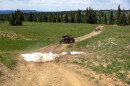 An adaptive drivers navigate the off-road vehicles in the Flat Tops mountain range, July 24, 2023, near New Castle.