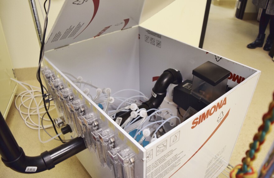 An air pump controlled by a computer creates a mixture of scents from various samples inside the olfactometer.