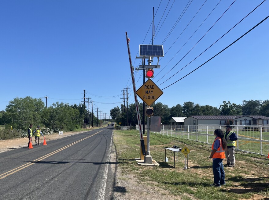 Testing the automated gate arms at a low water crossing outside the city of San Antonio in Bexar County at 14624 Shepherd Rd, Atascosa, TX 78002
