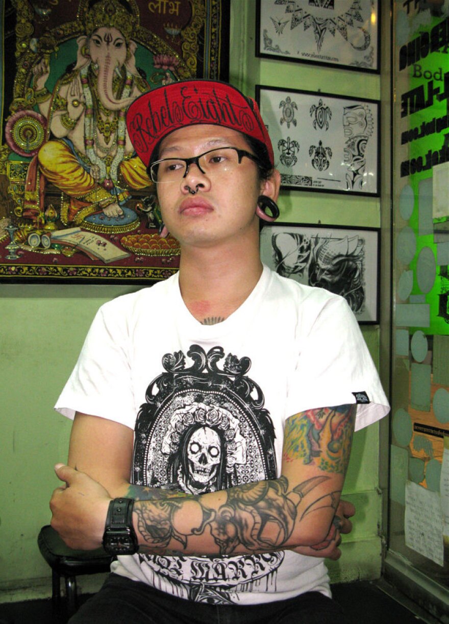 Pongsuk Tammaget, a tattoo artist in Bangkok's Khao San Road neighborhood, says he and other Thai Buddhists are offended by foreigners who get Buddhist images tattooed below the waist.