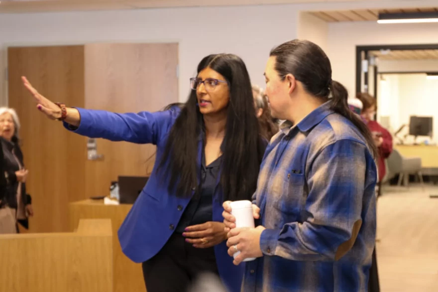 Aparna Palmer speaks with X̱’unei Lance Twitchell speak with each other at the Andrew Hope building in Juneau on March 27, 2026.