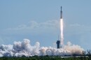 A SpaceX Falcon Heavy rocket lifts off from pad 39A at the Kennedy Space Center in Cape Canaveral, Fla., Wednesday, April 29, 2026. (AP Photo/John Raoux)