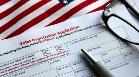 Voter registration form with flag of United States of America