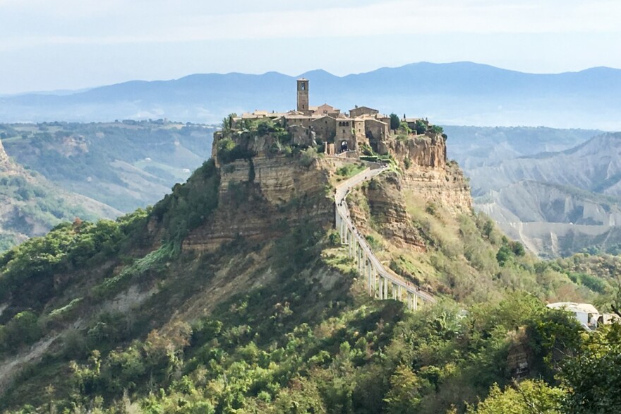 To get to Civita, one must take a long, winding footbridge from the neighboring town of Bagnoregio.