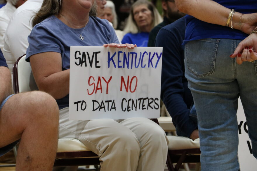 Many of the attendees at the Mercer County Fiscal Court meeting brought signs expressing opposition to data centers.
