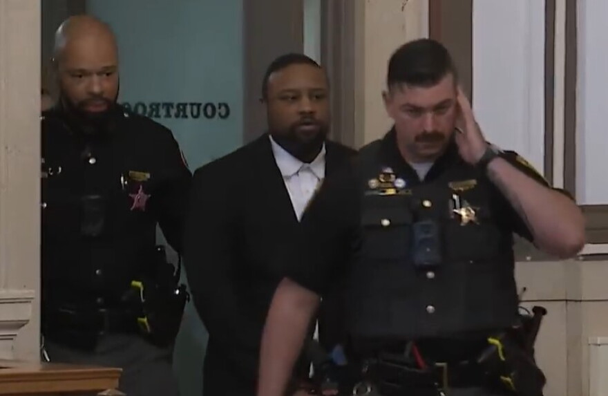 Deputies leading Rodney Hinton, Jr. into the courtroom of Hamilton County Common Pleas Judge Jody Luebbers