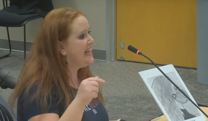 A speaker describes the Fayette County School Board as "oppressors" during a public comment session focusing on the district's mask mandate