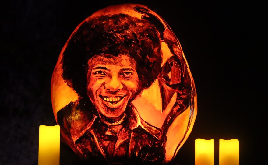A jack-o-lantern portrait of late musician Sly Stone