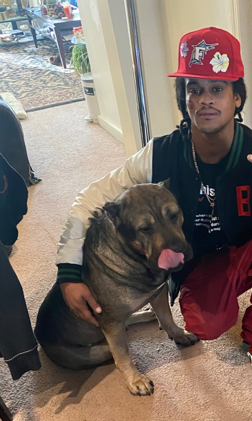 Jordan Young with his dog Shep.