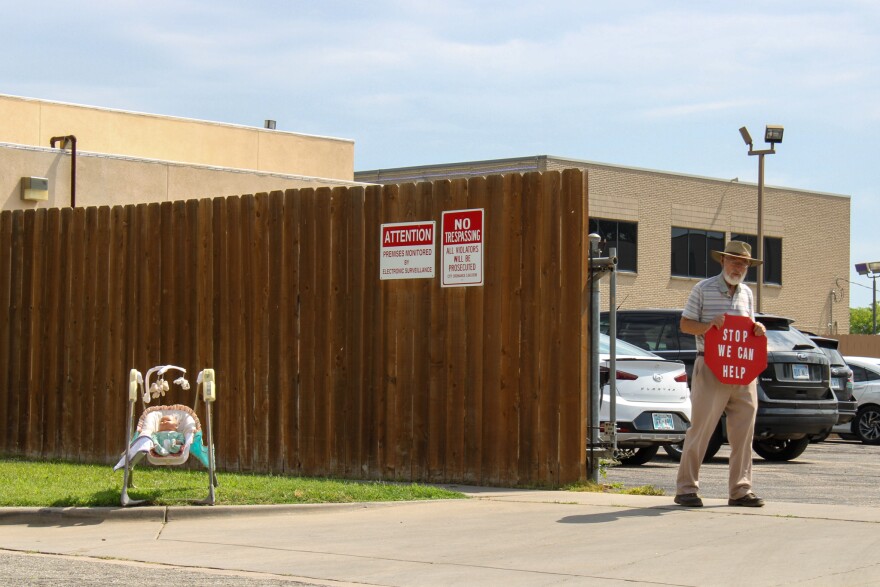 A loan anti-abortion protestor outside the Trust Women clinic in Wichita.