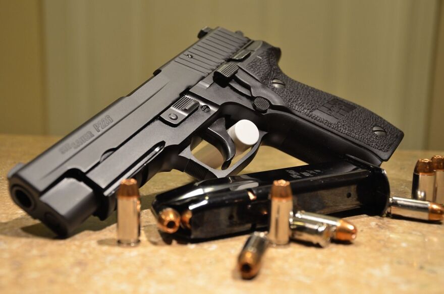 A Sig Sauer M11 handgun.