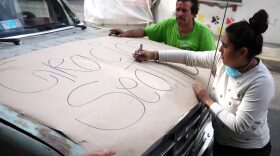 Friends and family in Mexico City write a thank you to people in Seattle who contributed to the earthquake victims. (Liz Jones/KUOW)