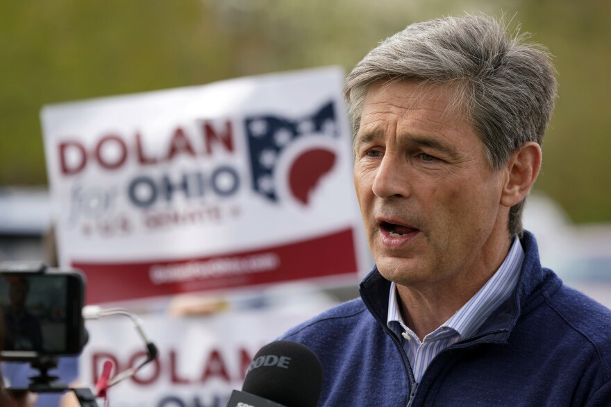 Republican U.S. Senate candidate Matt Dolan is interviewed while visiting a polling place at the Parma Heights Baptist Church in Parma Heights, Ohio, on Tuesday, May 3, 2022. (AP Photo/Gene J. Puskar)