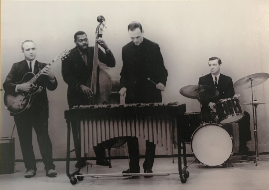 Rev. Richard Blank plays the vibraharp, one of the many instruments featured in his original Christmas carol compositions. Accompanied by Don Heminger on the guitar, Clifford Murphy on bass, and Bob White on drums.