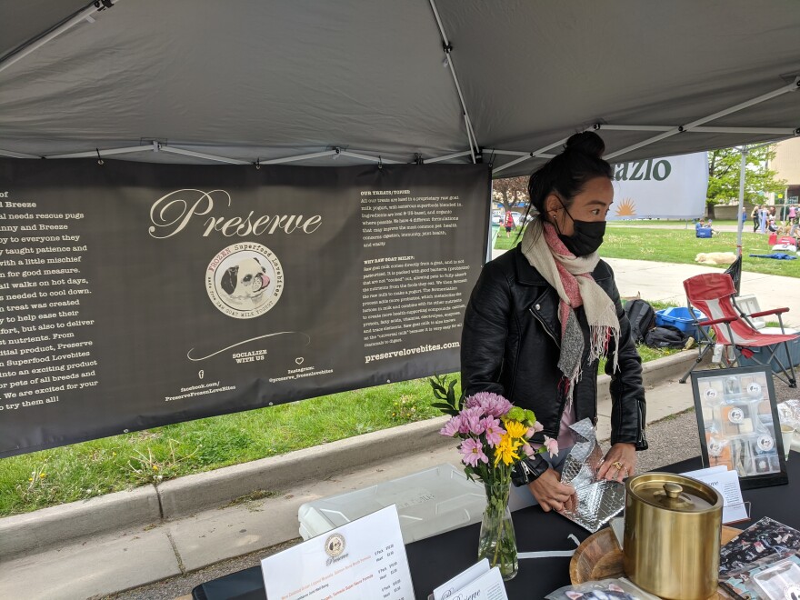 Annabelle Shin sells her frozen pet treats at the City Park Farmers Market in Denver