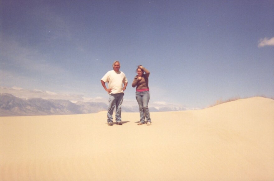 L’eaux Stewart and her father stand in the Keeler Dunes at the Owens Valley Dry Lake in the mid-2000s. The Dunes were created by the exposed lake bed and have been part of the massive dust problem for years. They grow each year due to the drought.