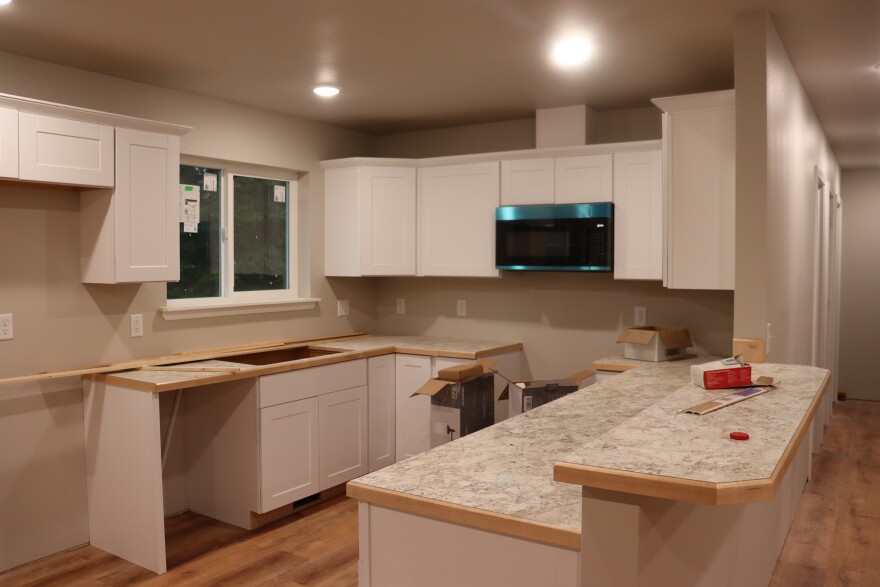 An unfinished kitchen in one of five homes that will soon be on the market in Kenai. Higher building costs have made it difficult to find meaningful ways to make a dent in the local housing market.