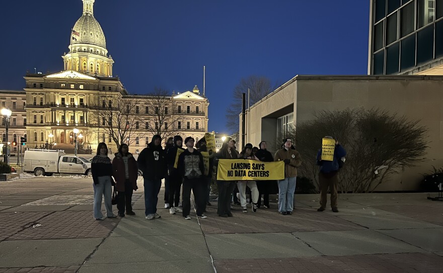 Sunrise Spartans, an environmental group from Michigan State University, held a protest outside of the city hall building prior to the meeting.