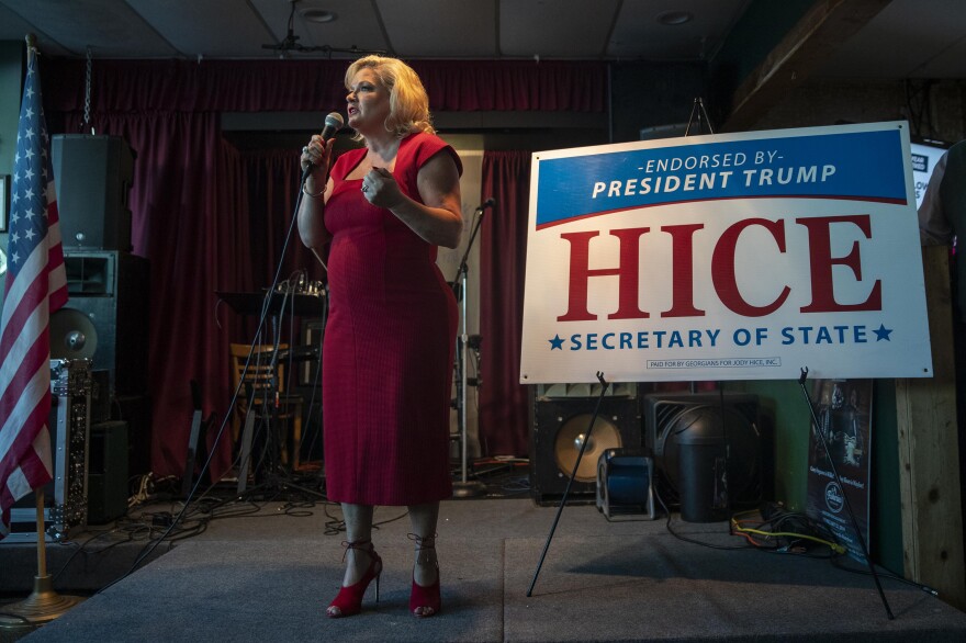 DeKalb County Republican Chair Marci McCarthy speaks during a campaign event for Hice at the Flying Machine restaurant in Lawrenceville, Ga.