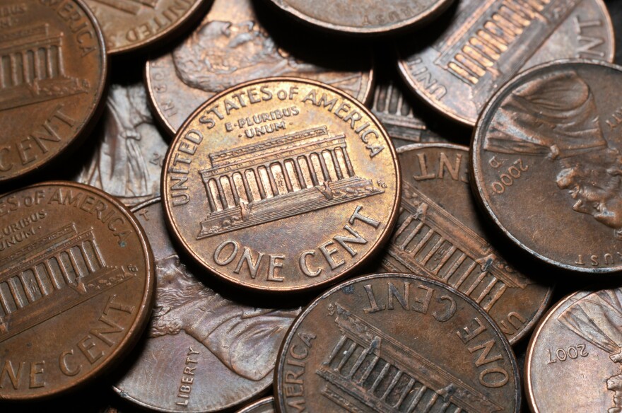 A close-up of a pile of United States pennies.