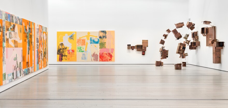 Cardboard boxes spring off the wall in Rauschenberg's <em>The 1/4 Mile.</em>