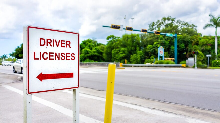 driver's licenses sign a side of street 
