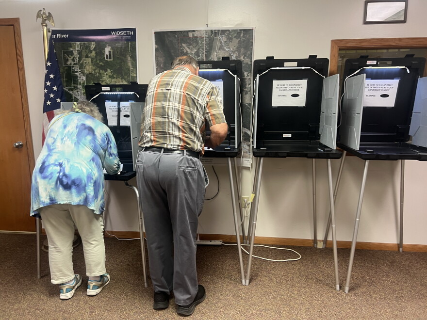 Janice McClure, left, and David McClure cast their votes together on Primary Election Day, Aug. 11, 2026, at Deer River City Hall. The couple has been married for 64 years and have lived in Deer River since 1968.