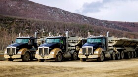 95-foot-long Black Gold Transport trucks haul ore excavated from the Monh Choh gold mine near Tetlin.