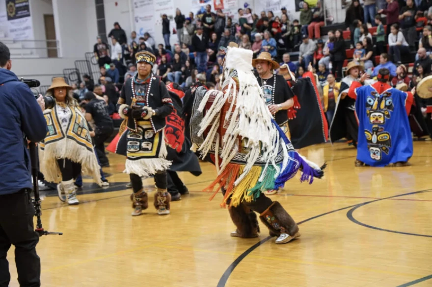 The Eagle Raven Dance Group brought the Ravenstail Weaving Our Pride robe to life during the Gold Medal basketball tournament at Juneau-Douglas High School: Yadaa.at Kalé on Tuesday, March 24, 2026.